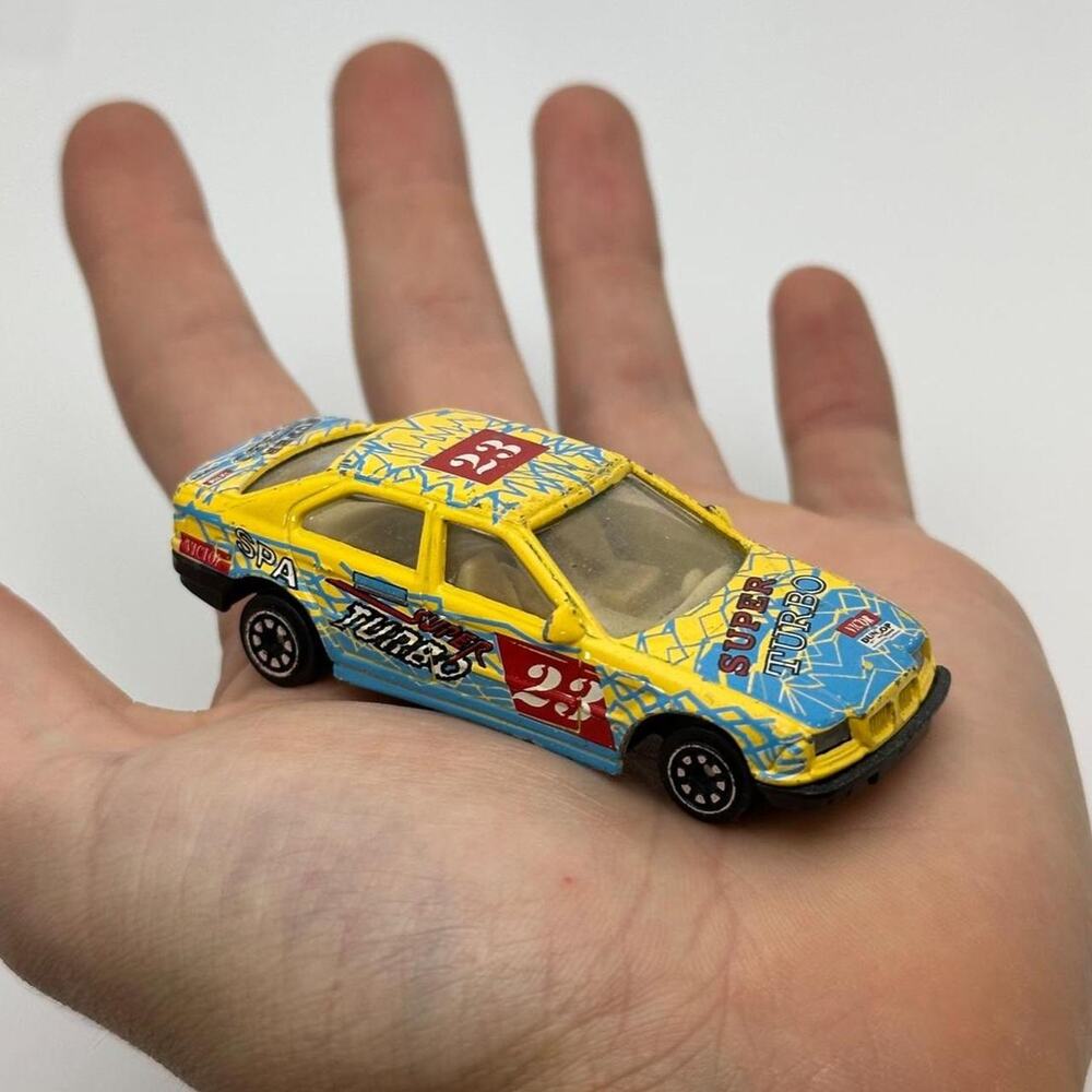 Vintage 90s Pioneer BMW 3 Series Turbo 1:64 Diecast Yellow Mini Car